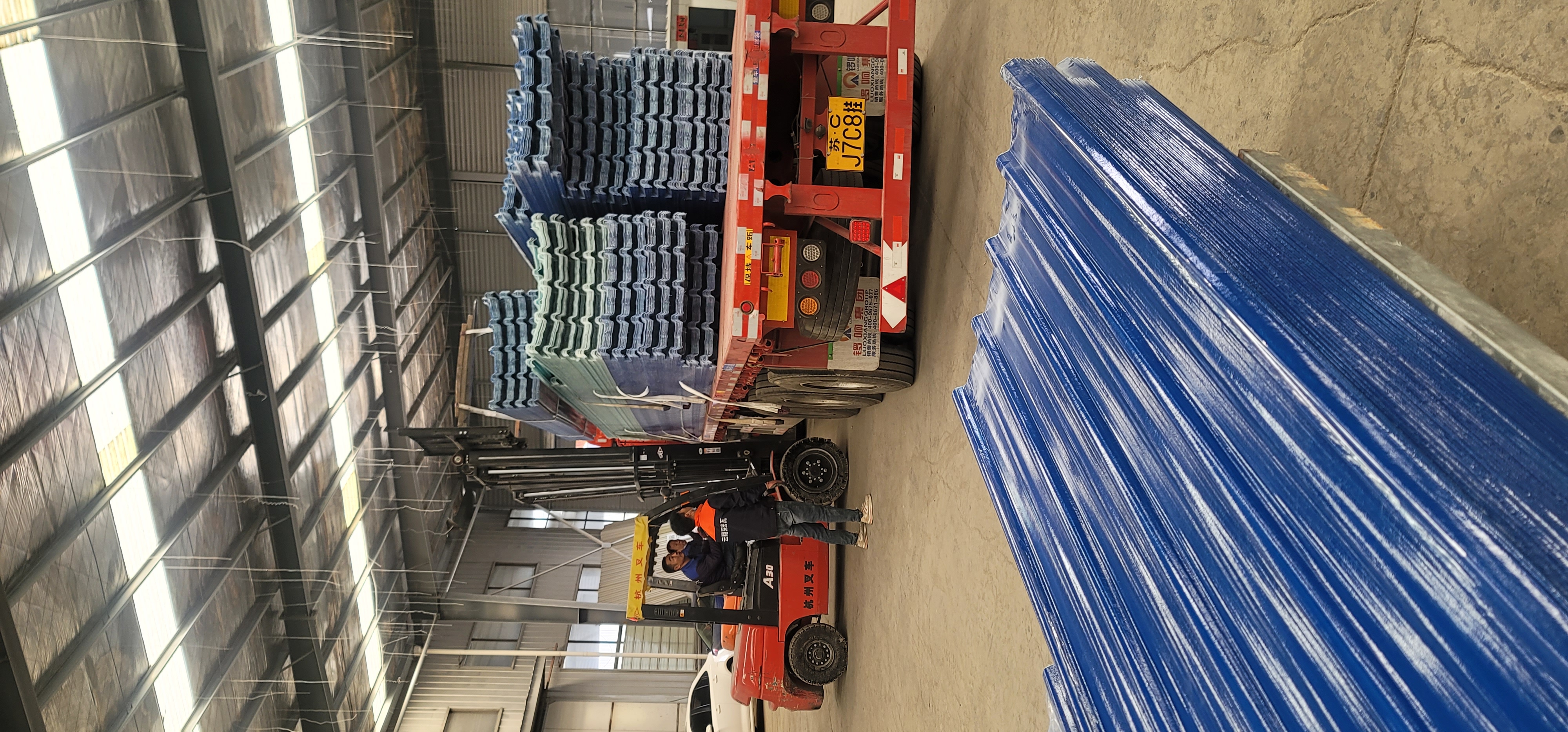 Finished FRP sheets organized before loading